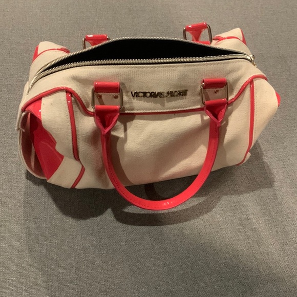 Victoria's Secret Handbags - Victoria Secret cloth and rubber Purse